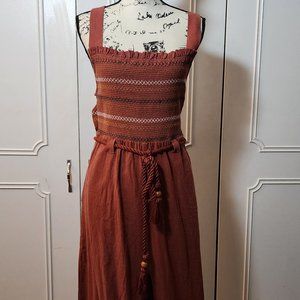 Burned orange colored jumpsuit